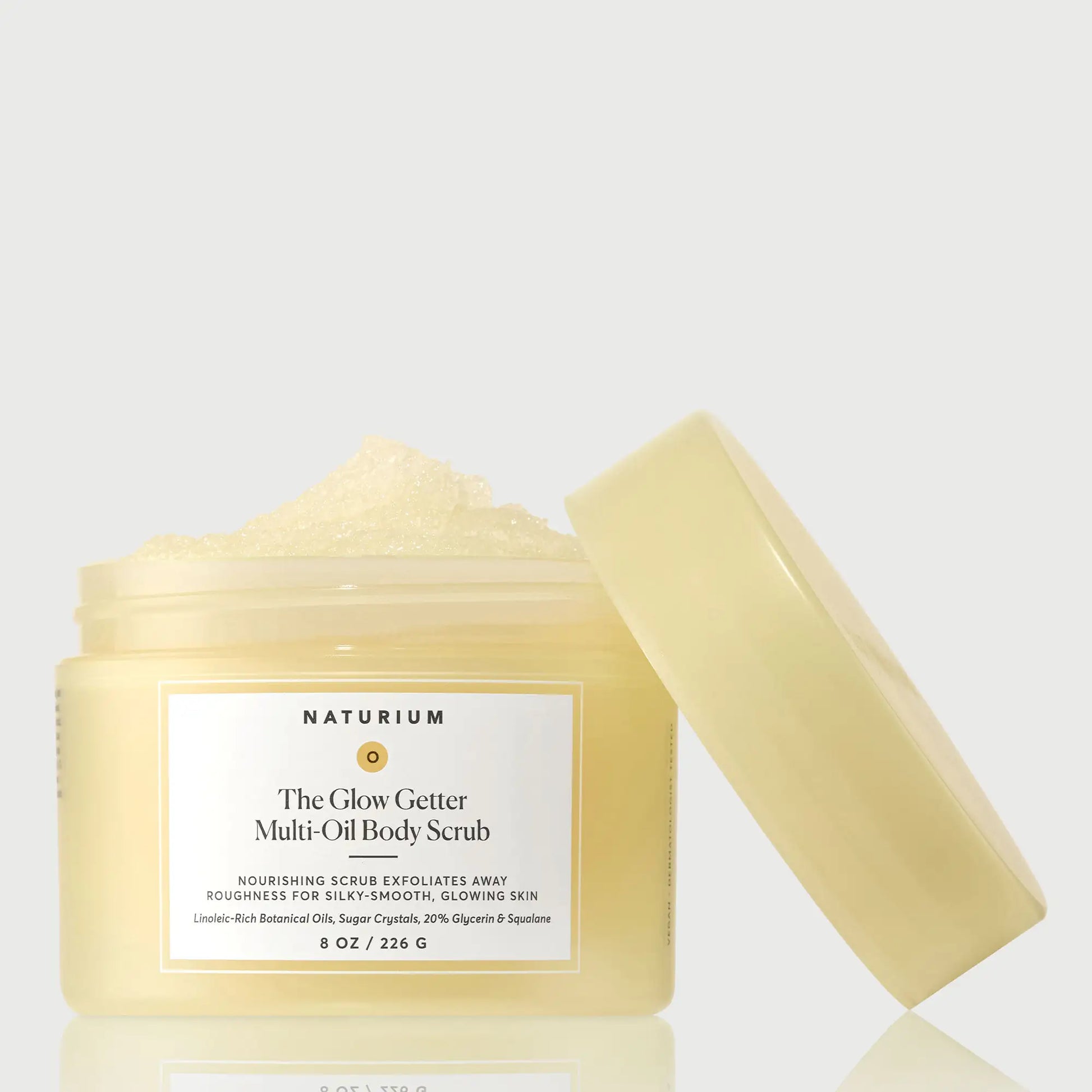 the-glow-getter-multi-oil-body-scrub-h4 NATR-40028-GlowGetter-Multi-Oil-Body-Scrub-Front-CapOff-bonebkgd.webp